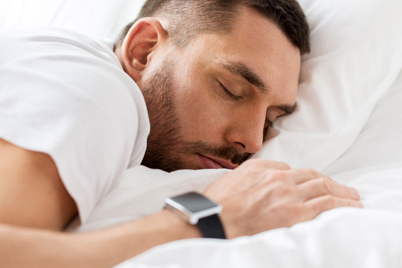 Man sleeping in bed